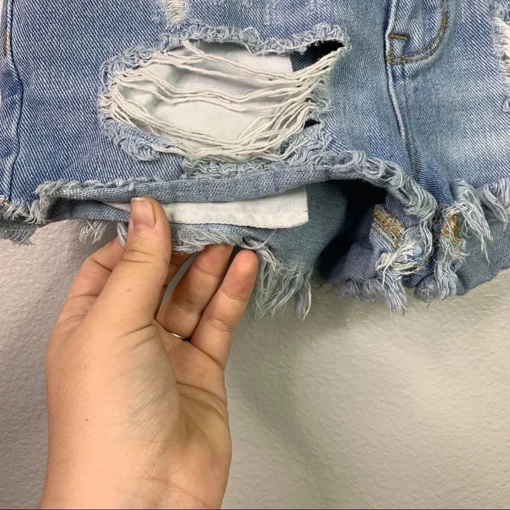 Kendall and Kylie denim patch distressed shorts